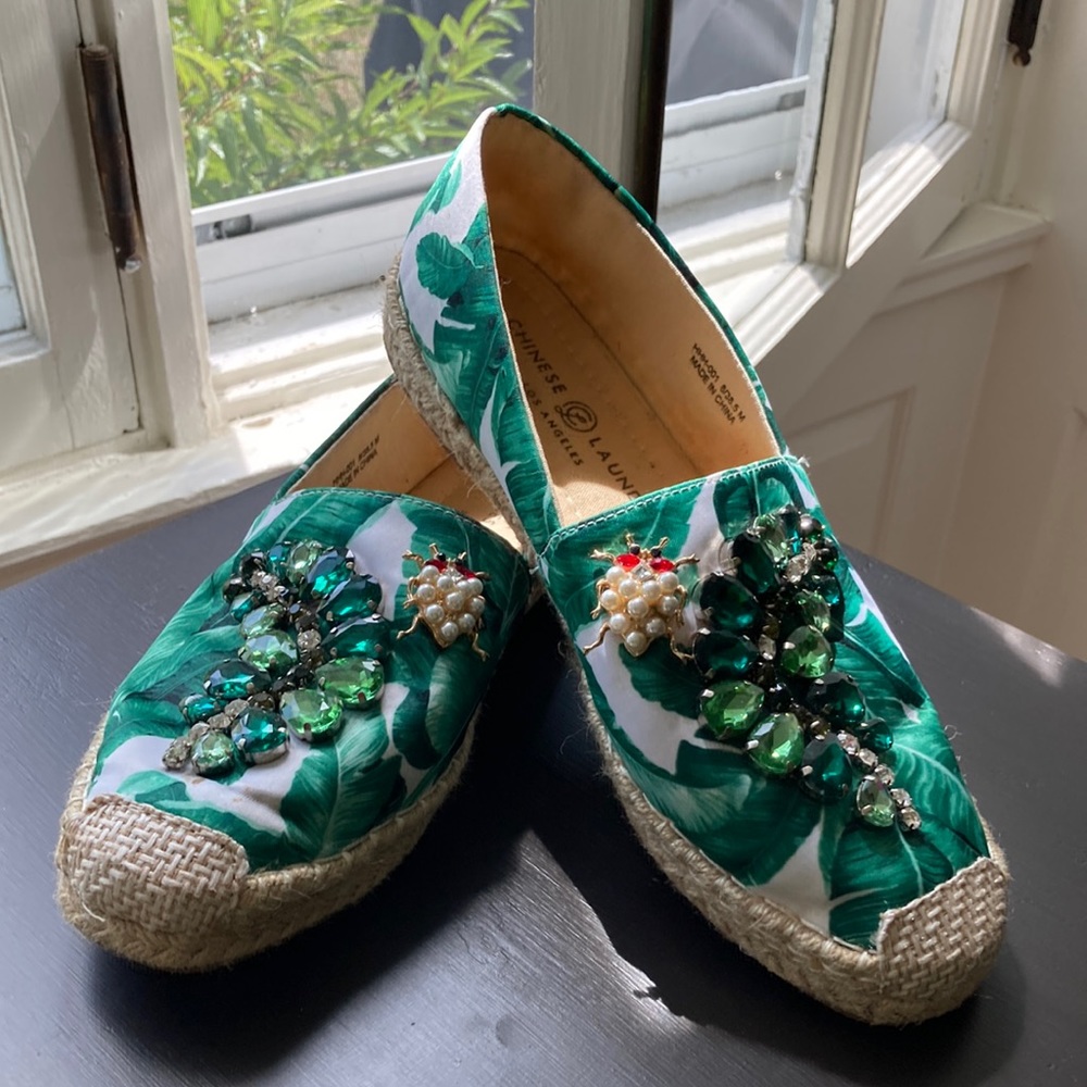 Bejeweled espadrilles with pearl bug and emerald leaves. Sure to dazzle.